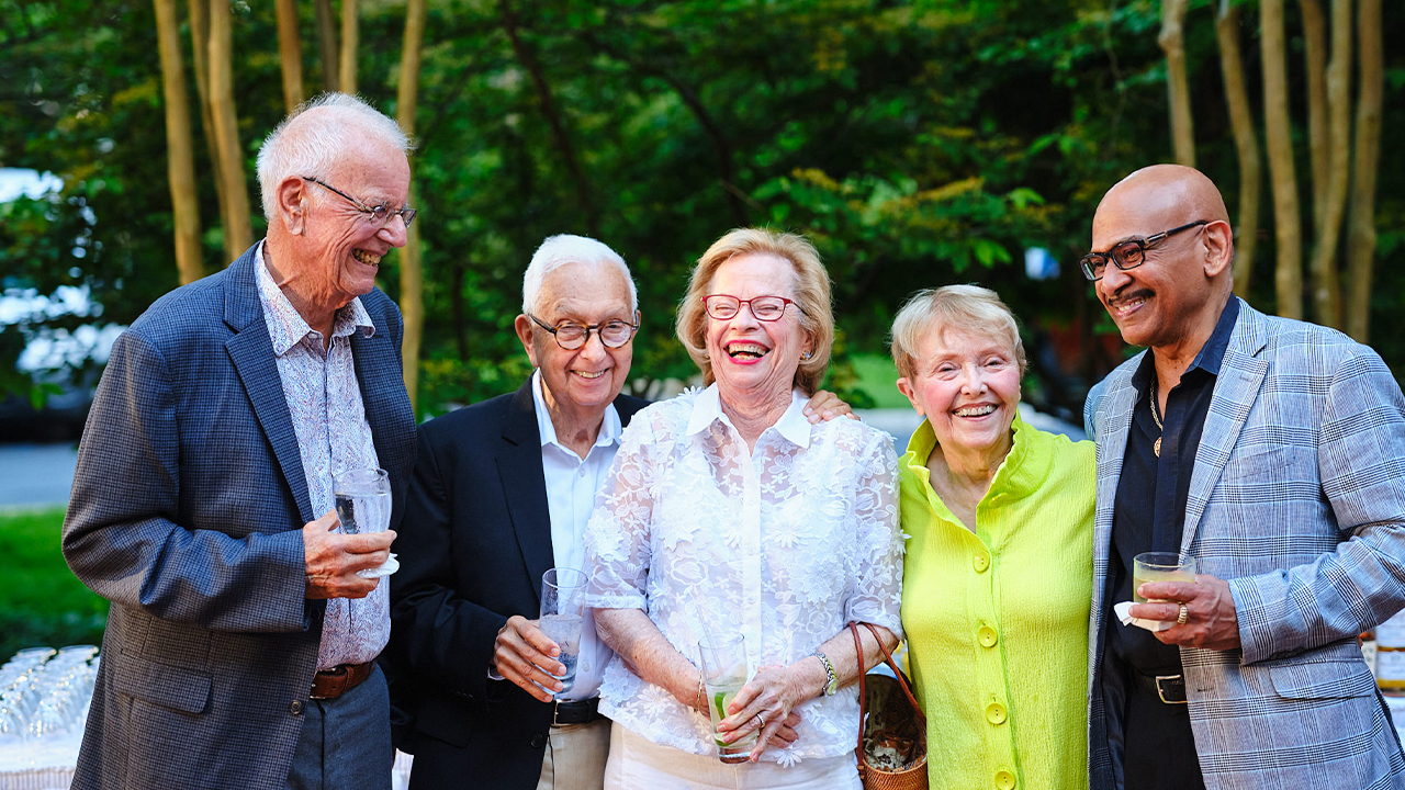 women high-fiving each other
